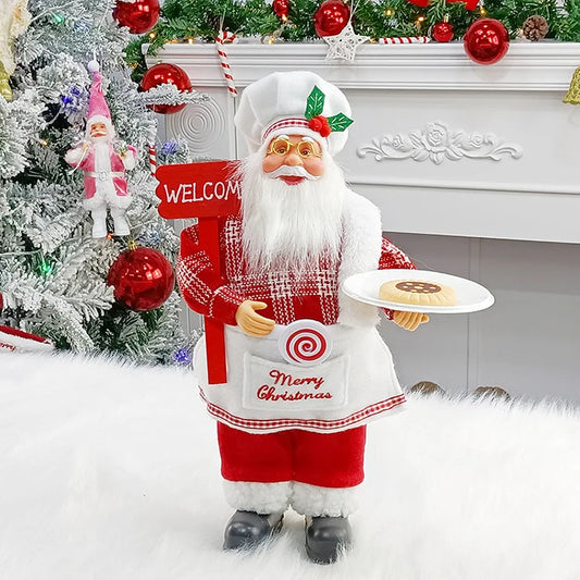 Decorative Santa Claus figure holding a plate with cookies, standing in front of a Christmas tree and fireplace.