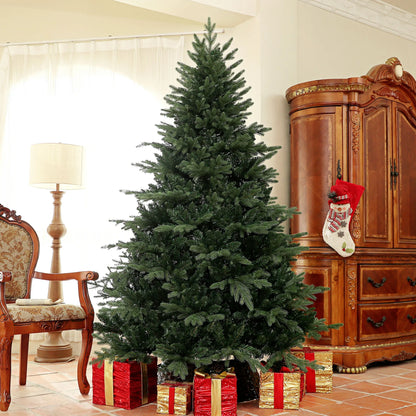 Decorated Christmas tree with presents and a stocking in a living room setting.