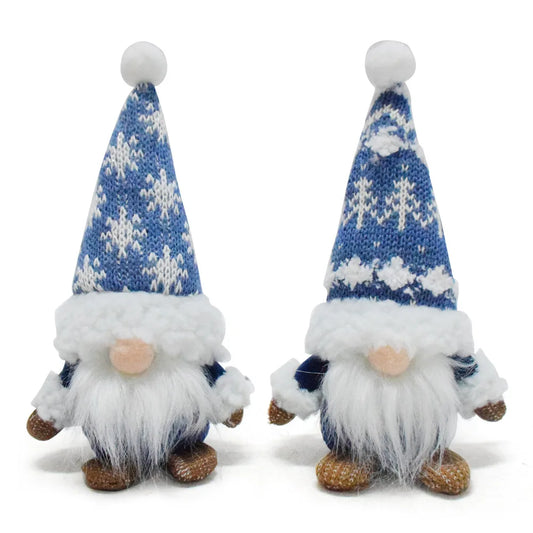 Two Christmas-themed gnomes with blue snowflake hats on a white background