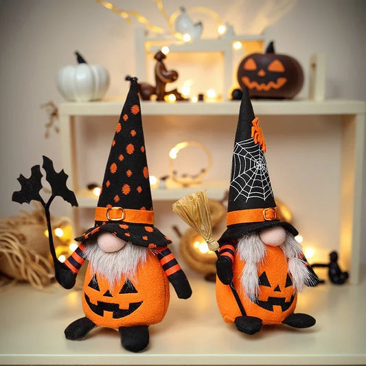 Two Halloween-themed gnomes with black and orange hats on a decorative background.