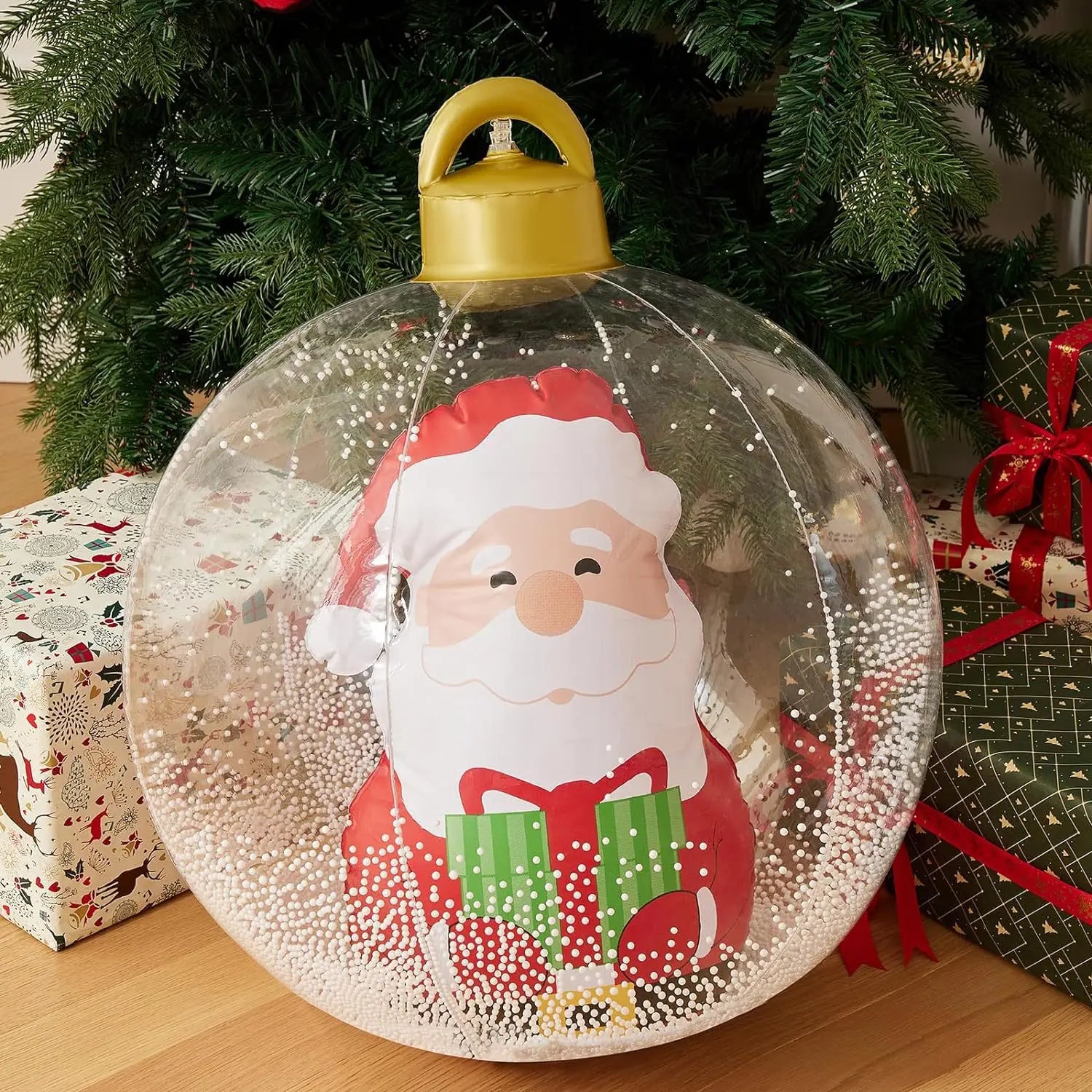 Clear Christmas ornament with Santa Claus design, surrounded by festive decorations and presents.